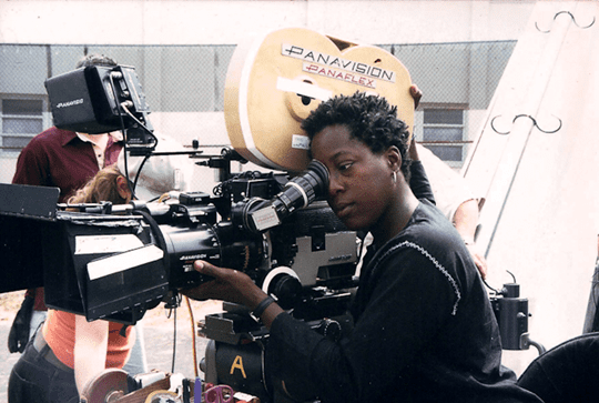 Black Female filmmaker behind camera